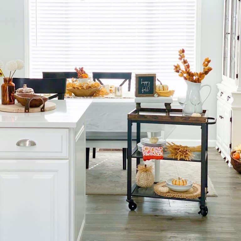 White Kitchen and Dining Room with Rustic Bar Cart