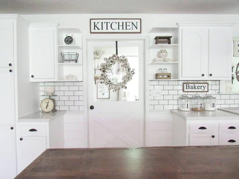 White Kitchen with Signs and Wreath