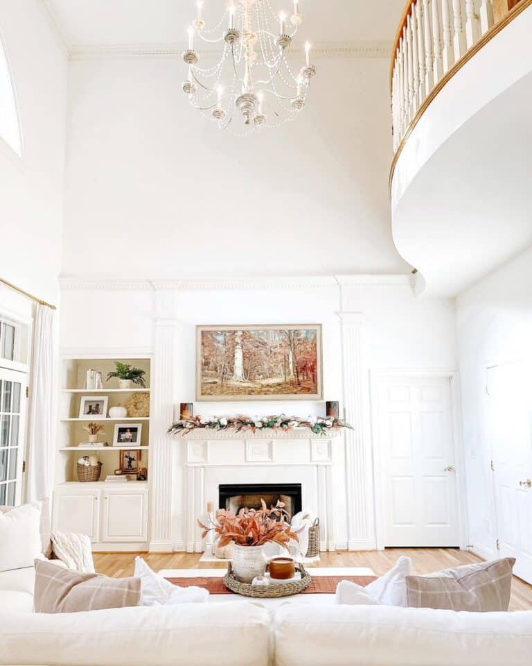 White Living Room with Fireplace and Fall Coffee Table Decorations
