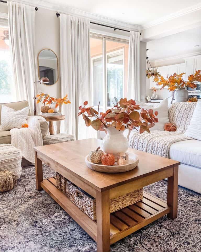 White Living Room with Vases of Autumn Leaves