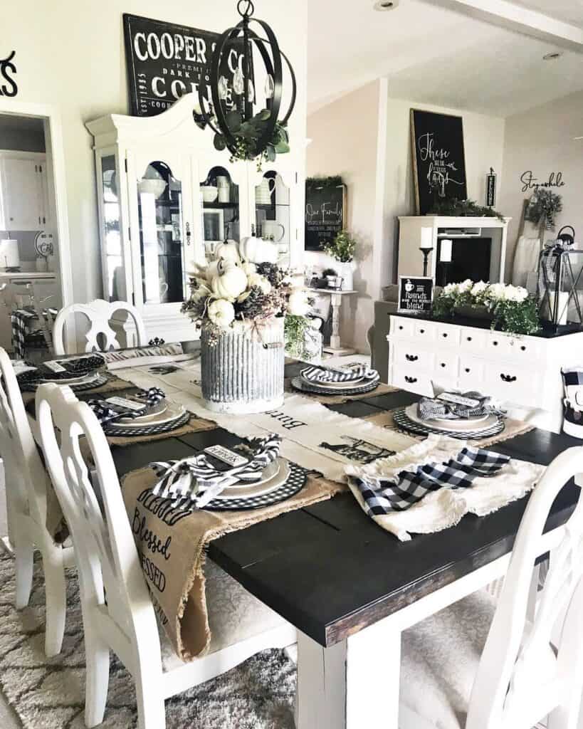 White Pumpkin Centerpiece on a Black Dining Room Table