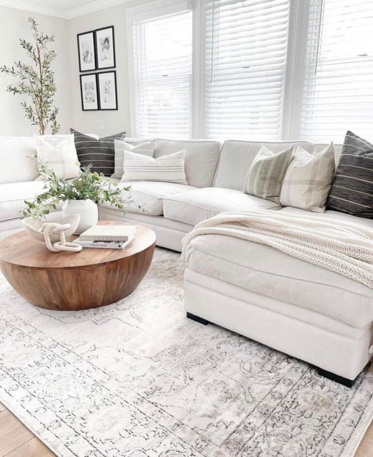 White Sectional with Wood Drum Coffee Table