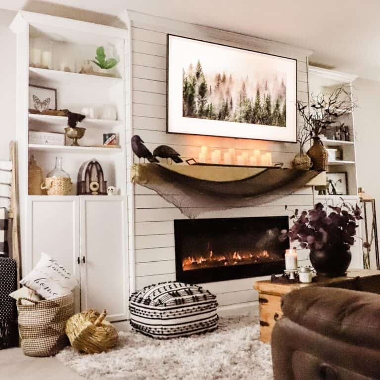 White Shiplap Fireplace with Black and White Pouf