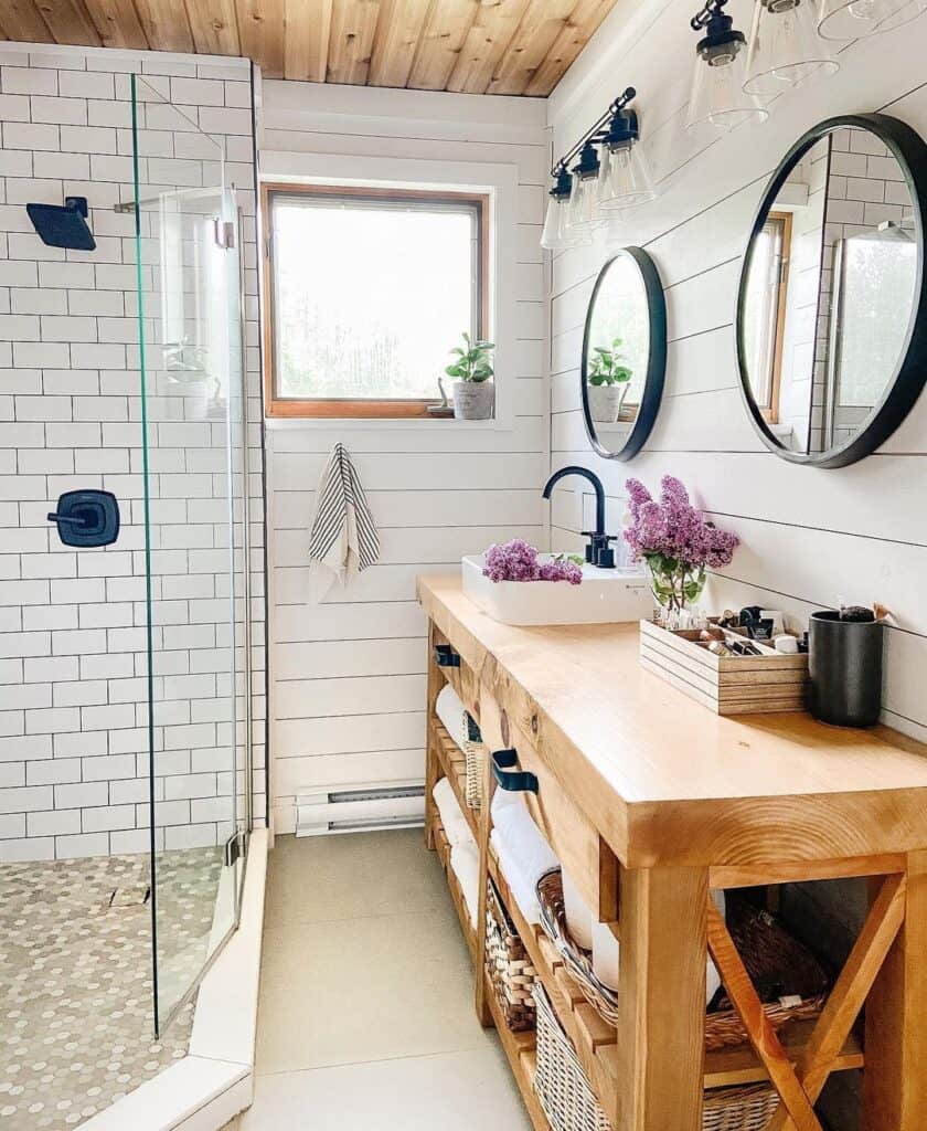 White Shiplap and Subway Tile bathroom with Natural Wood Vanity