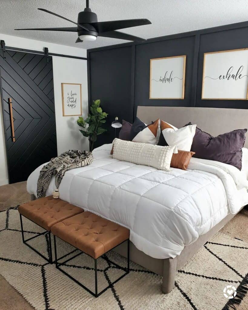 White Signs on a Black Paneled Bedroom Wall