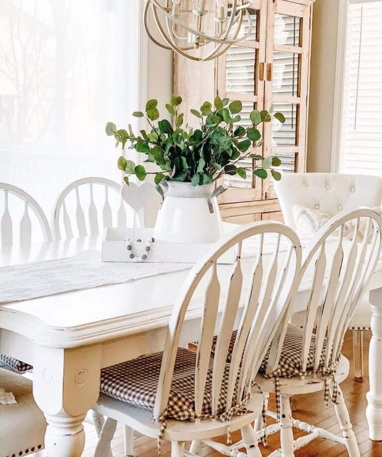 White Table and Chairs with Gingham Cushions