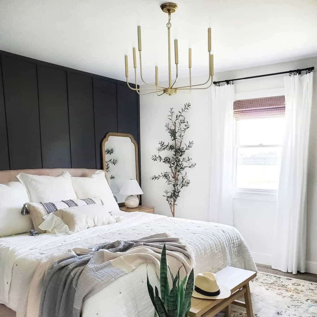 White and Gold Bedroom with Black Accent Wall