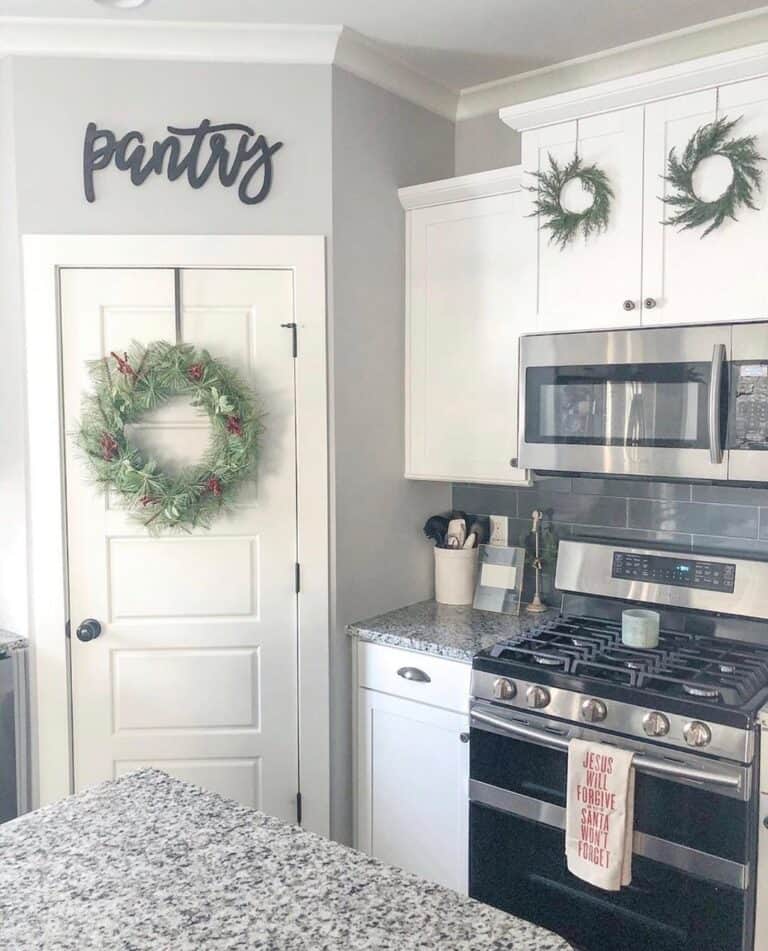 White and Gray Kitchen Decorated with Wreaths