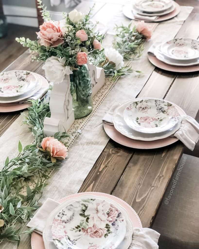 Wood Table with Pink Peonies and Green Garland