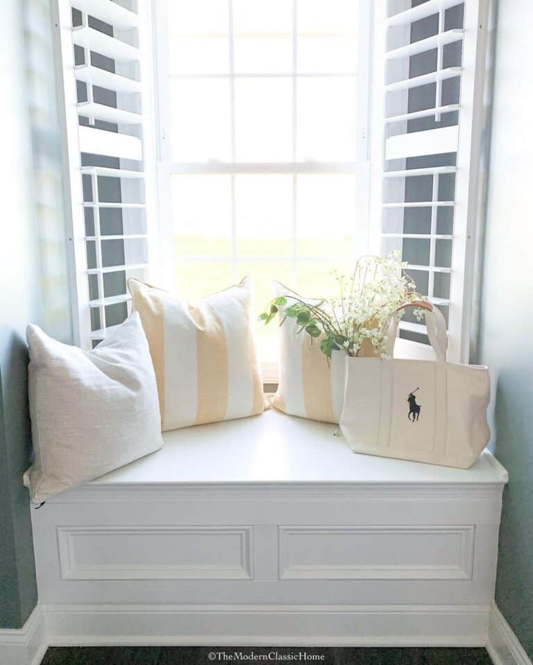 Yellow Accent Pillows and White Shutters