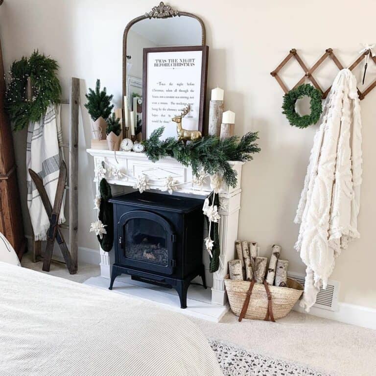 A Golden Reindeer and Pine Trees on a White Mantel