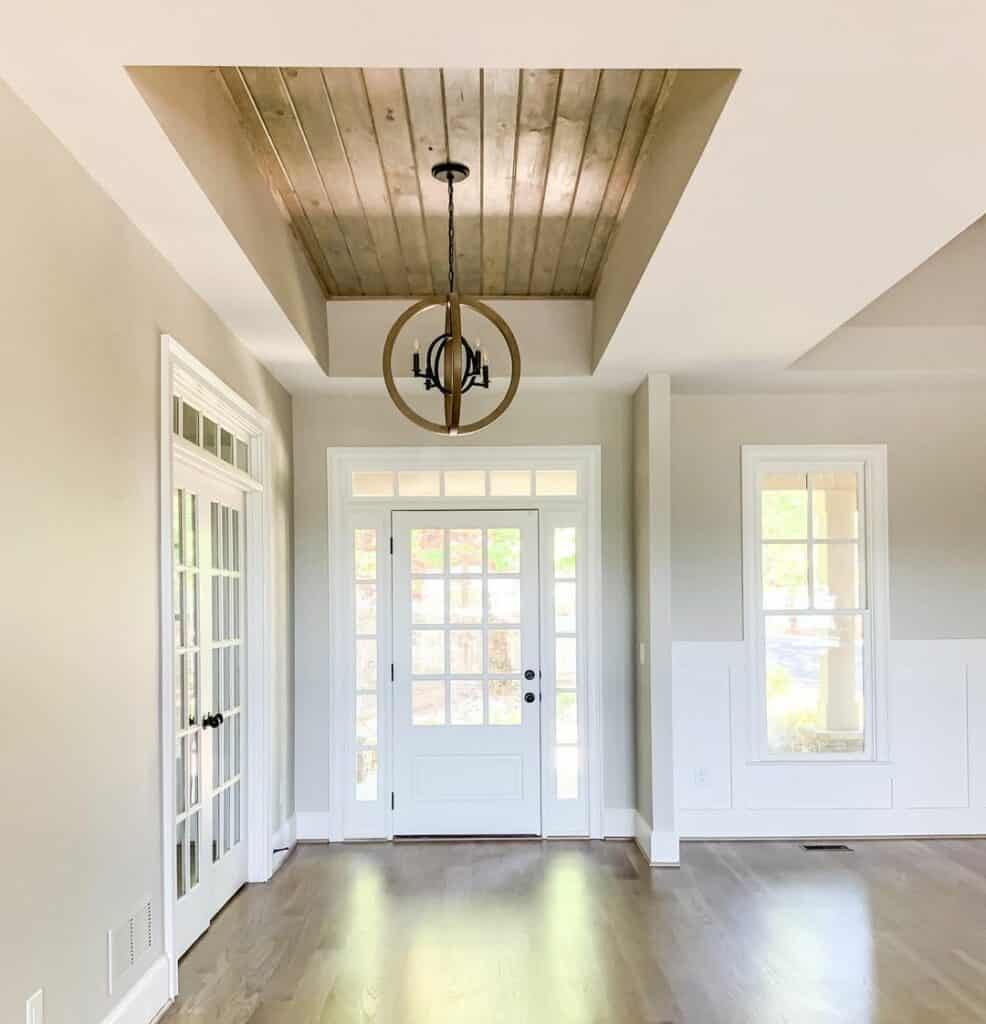 Airy Foyer with Wood Detailing