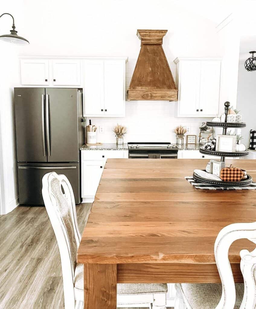 All-White Kitchen with Wood Table