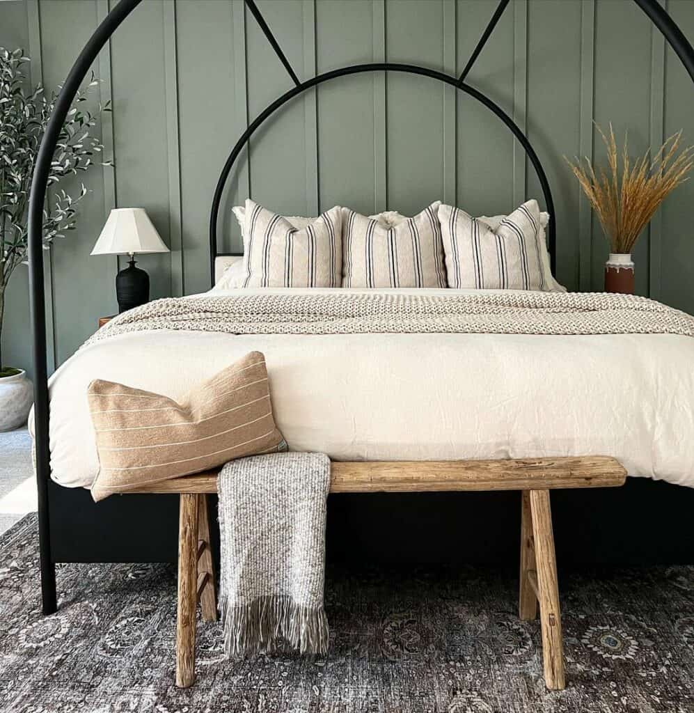 Antique Wood Bench in Front of Bed