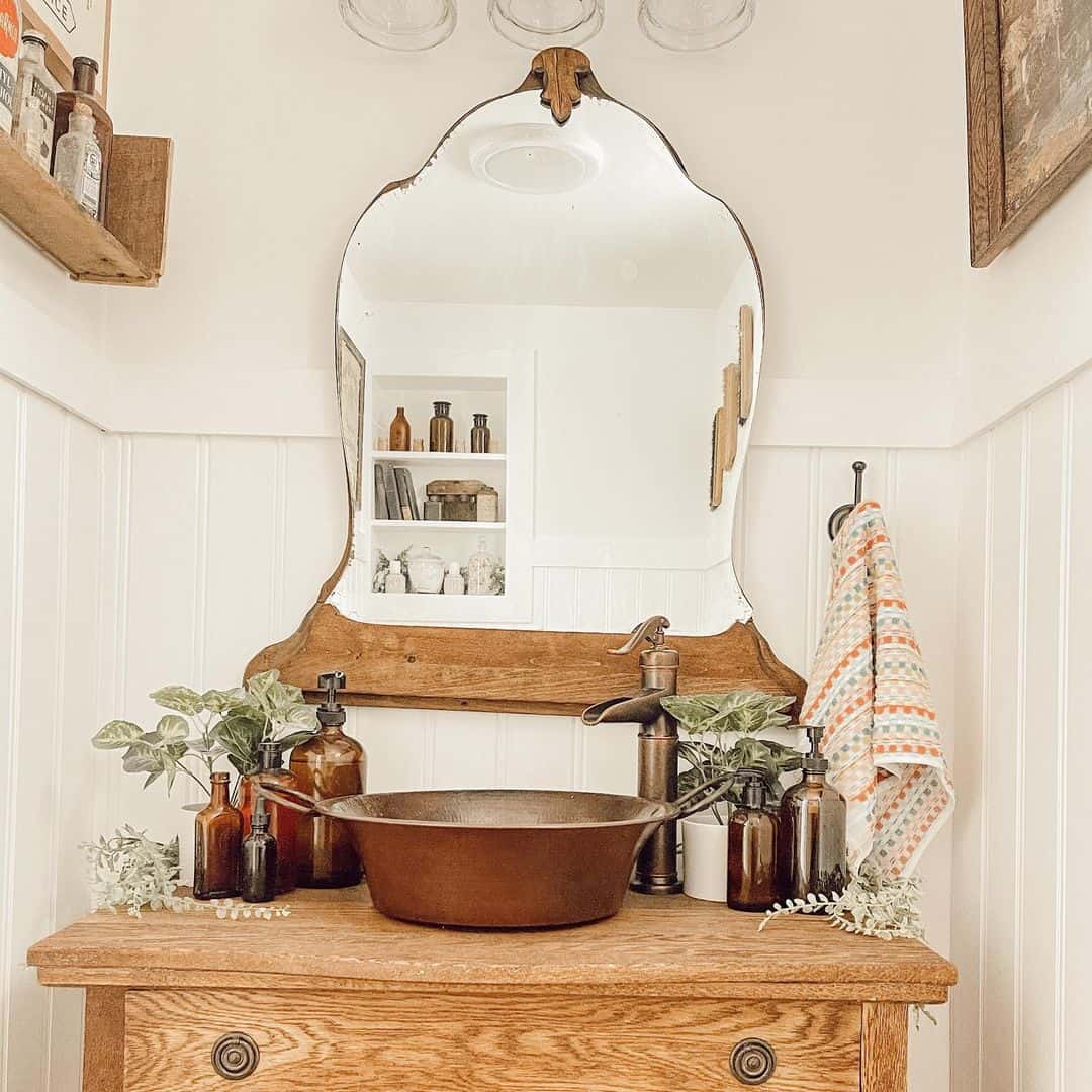 Bathroom with Repurposed Dresser and Bronze Sink Soul & Lane
