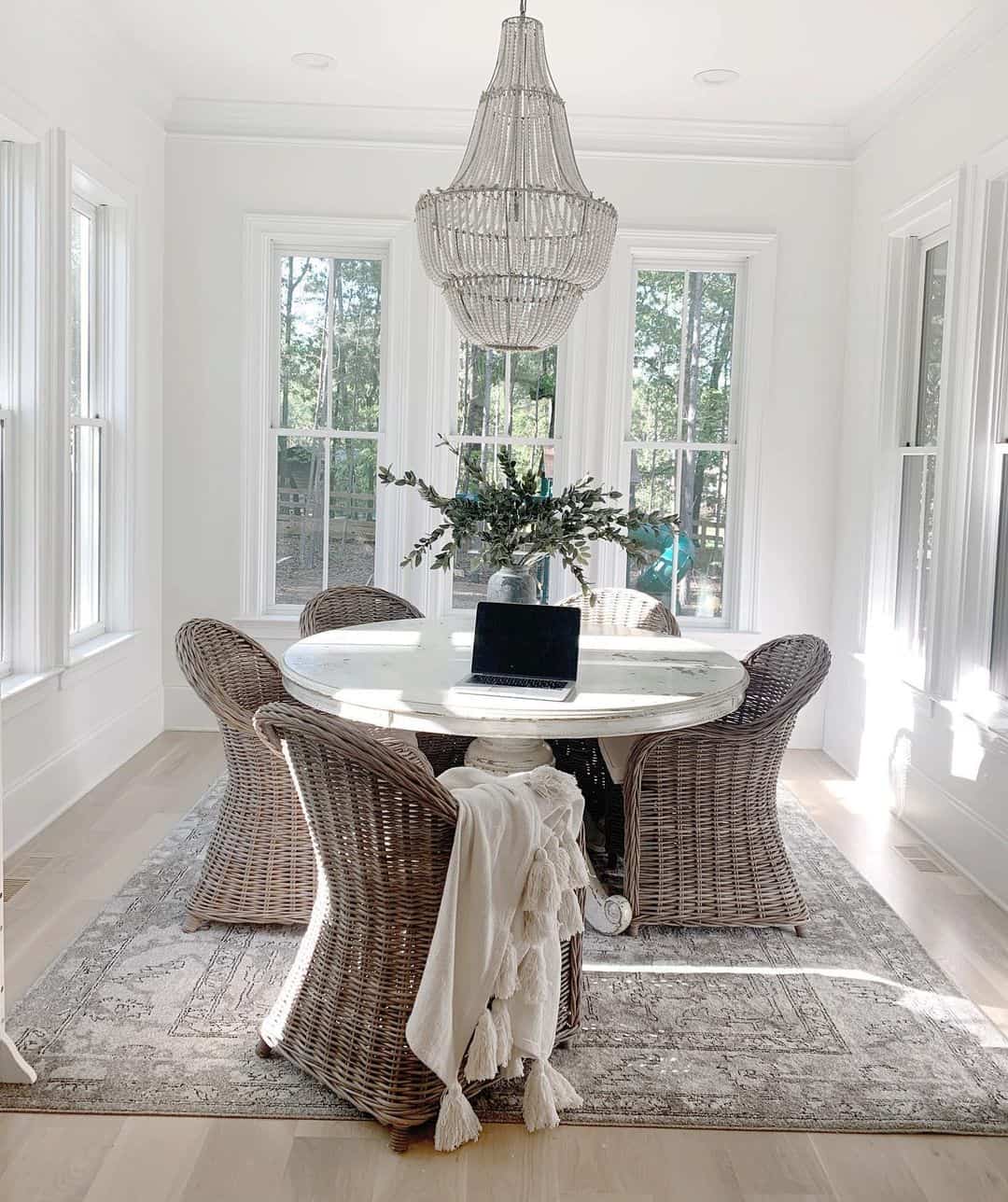 27 Versatile Round White Dining Tables To Accessorize Any Room