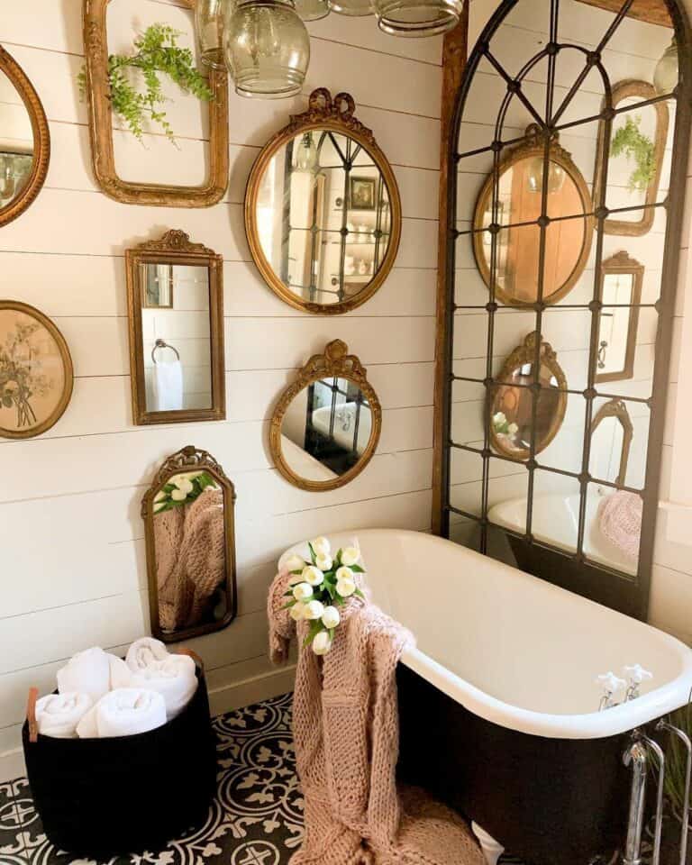 Beautiful Mirrors and Gold Frames on White Shiplap Walls