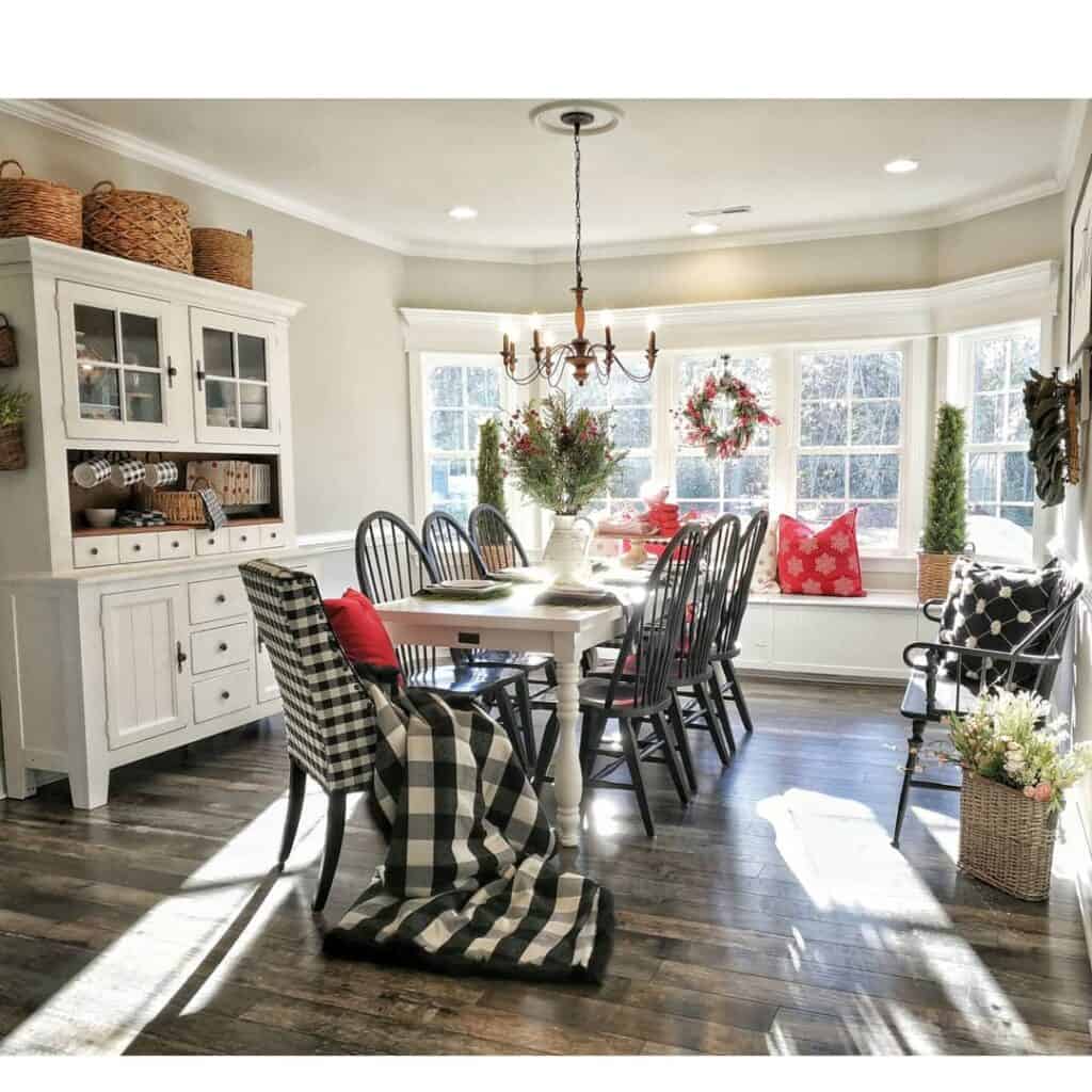 Black Candelabra Chandelier and a Buffalo Plaid Blanket