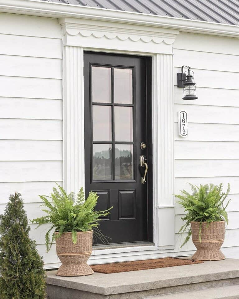 Black Door with Decorative White Trim