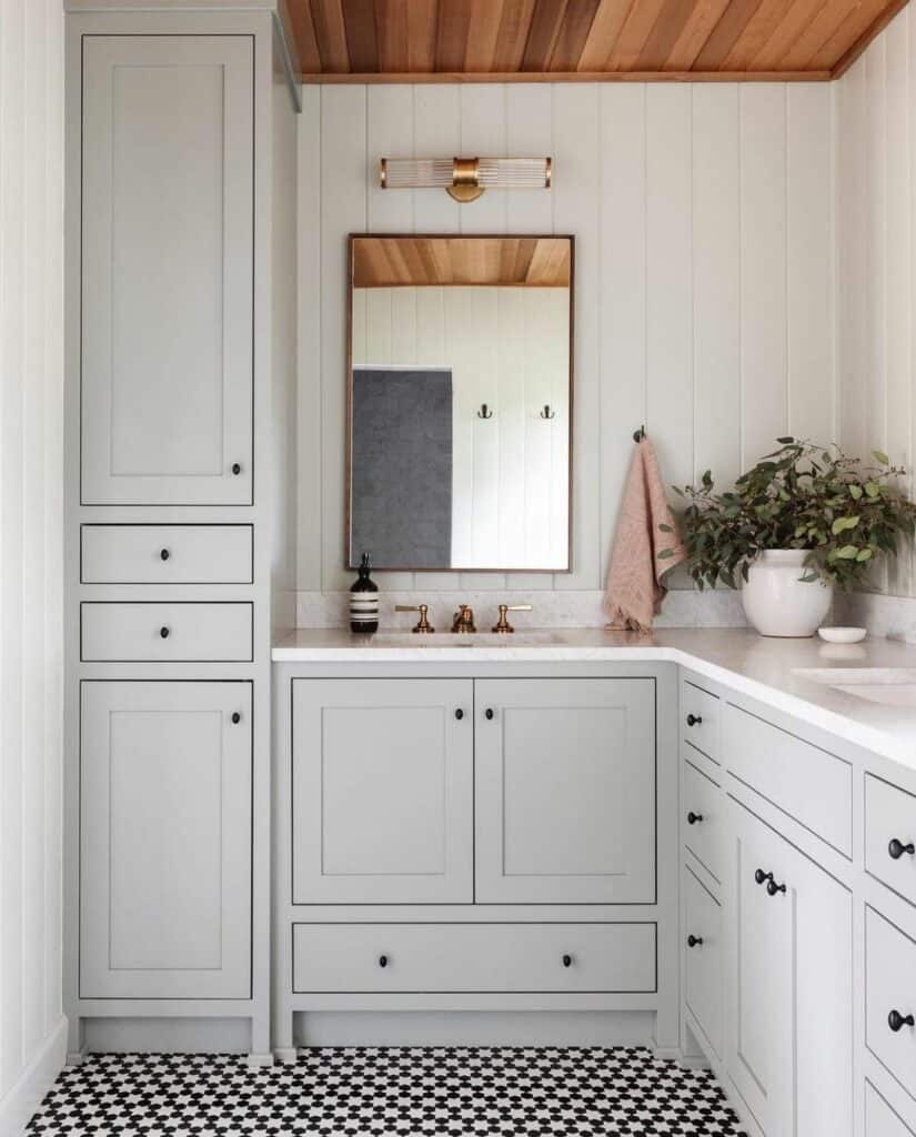 Black Knobs with a Mosaic Tile Floor