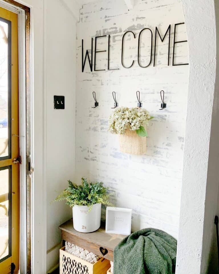 Black Lettered Sign as Small Entryway Wall Décor