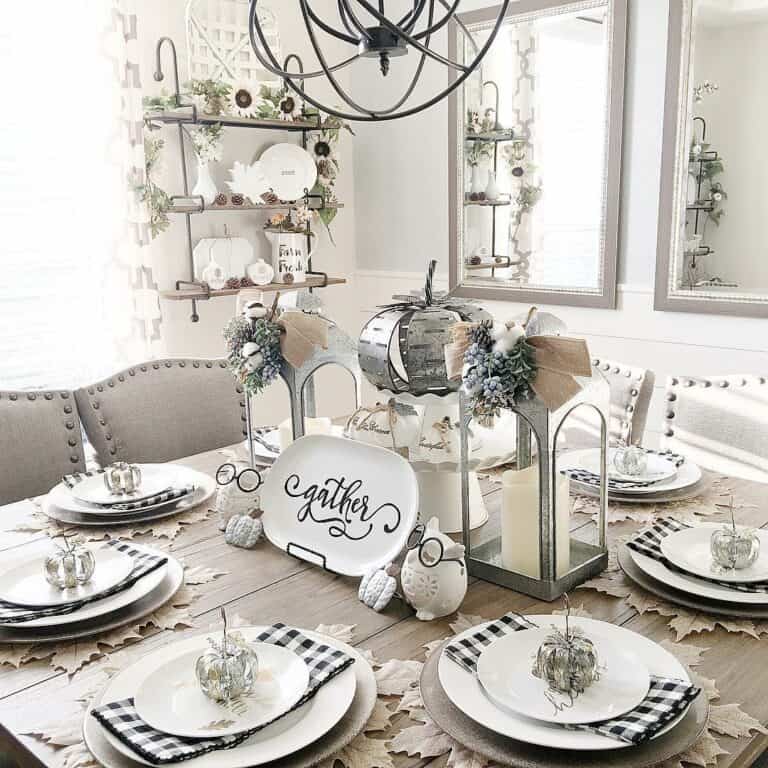 Black Orb Chandelier Above Metal Lantern Décor