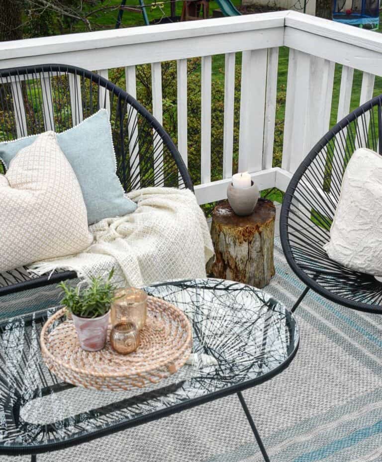 Black Patio Set on Porch with White Railing