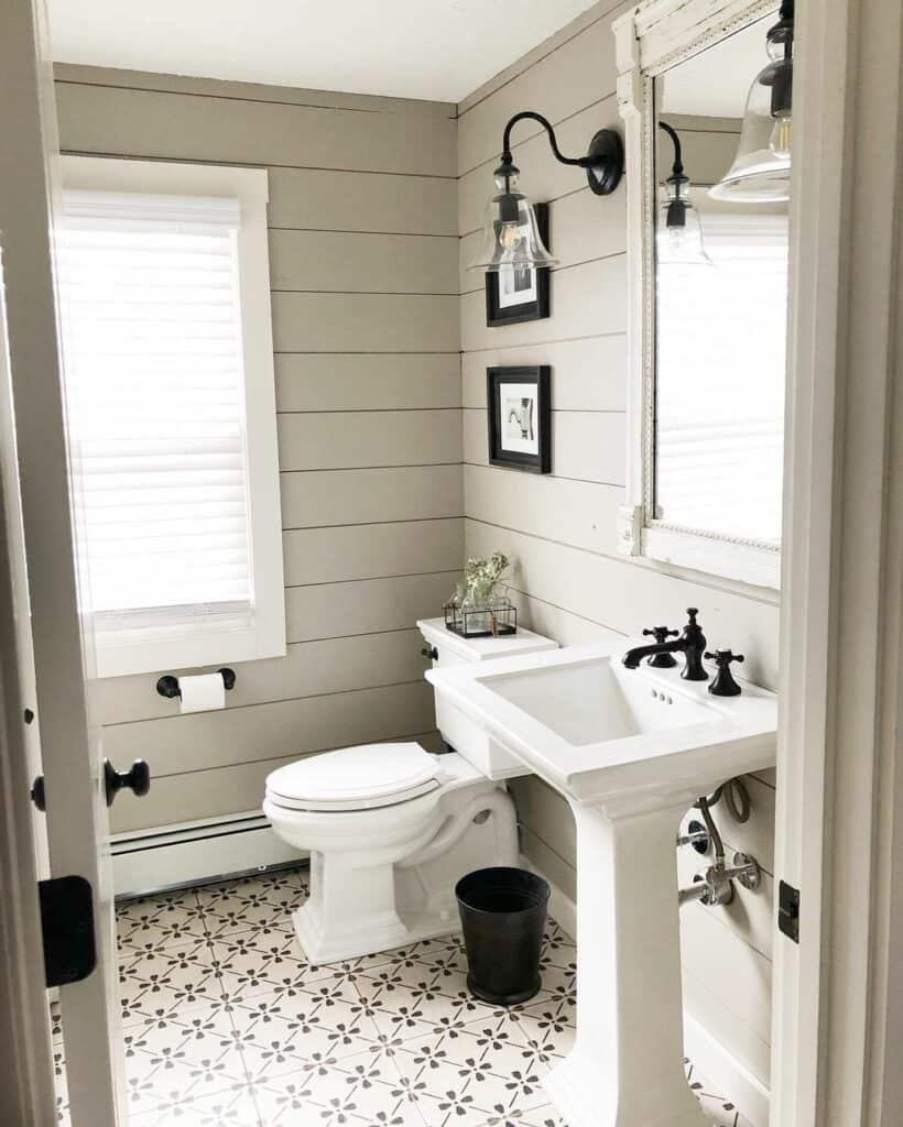 Black Sconces on a Taupe Shiplap Wall