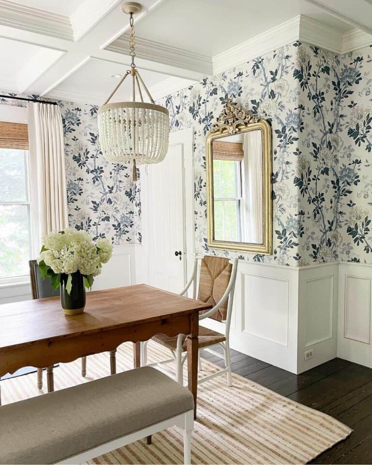 Blue Floral Wallpaper and Short White Half Wall Wainscotting