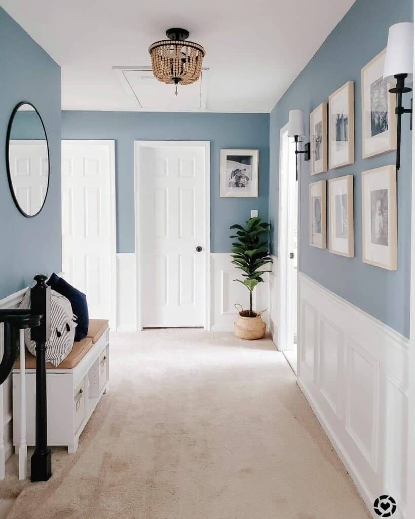 Blue Hallway Wall With White Half-Wall Wood Paneling