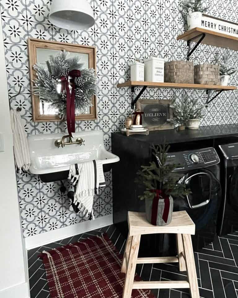 Blue and White Tile Wall and a Black Herringbone Tile Floor