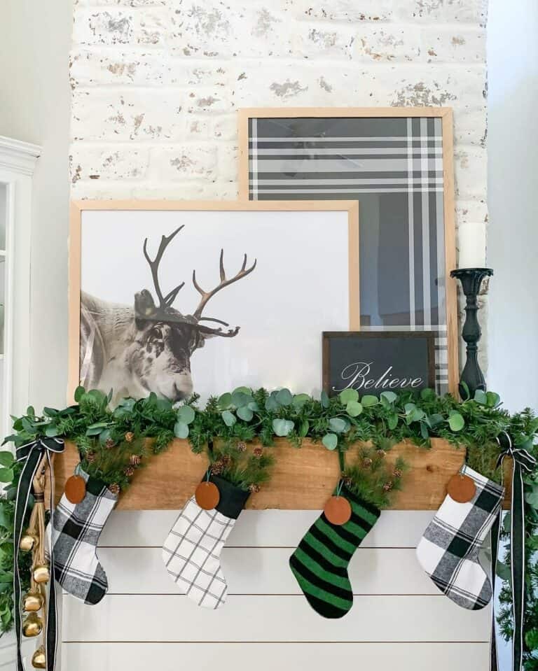 Brass Bells and Colorful Stocks on a Wooden Mantel