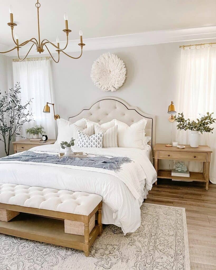 Brass Swing Arm Sconces Above Nightstand Décor