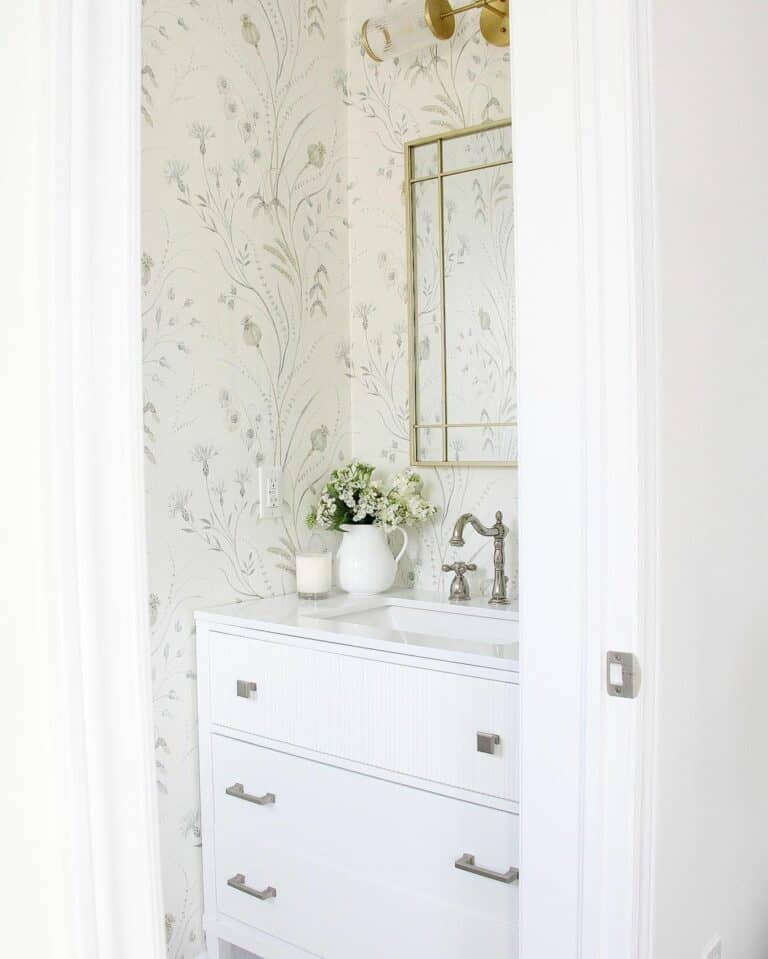 Bright Powder Room With Subtle Floral Wallpaper