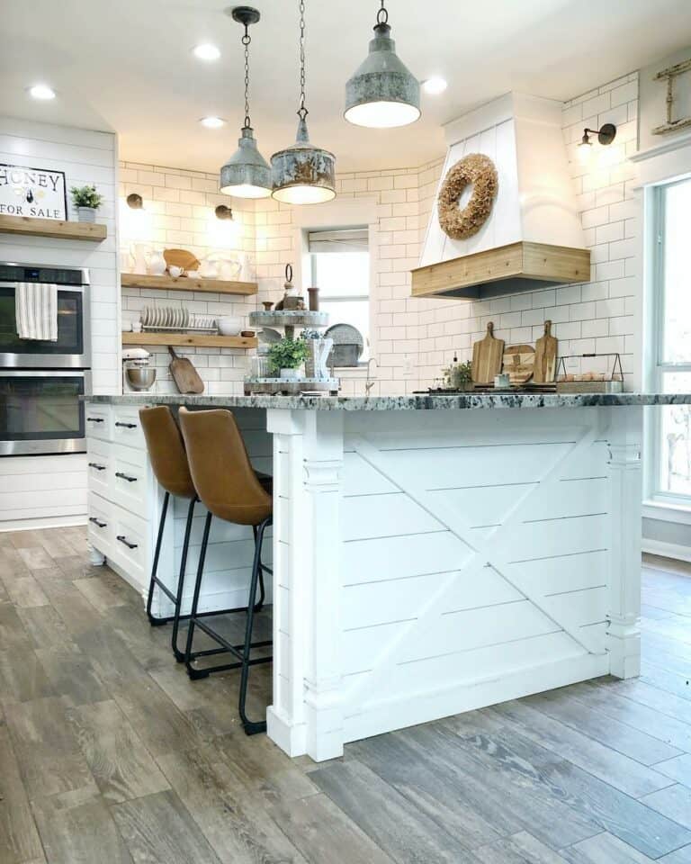 Brown Leather Chairs In Cozy Farmhouse Kitchen