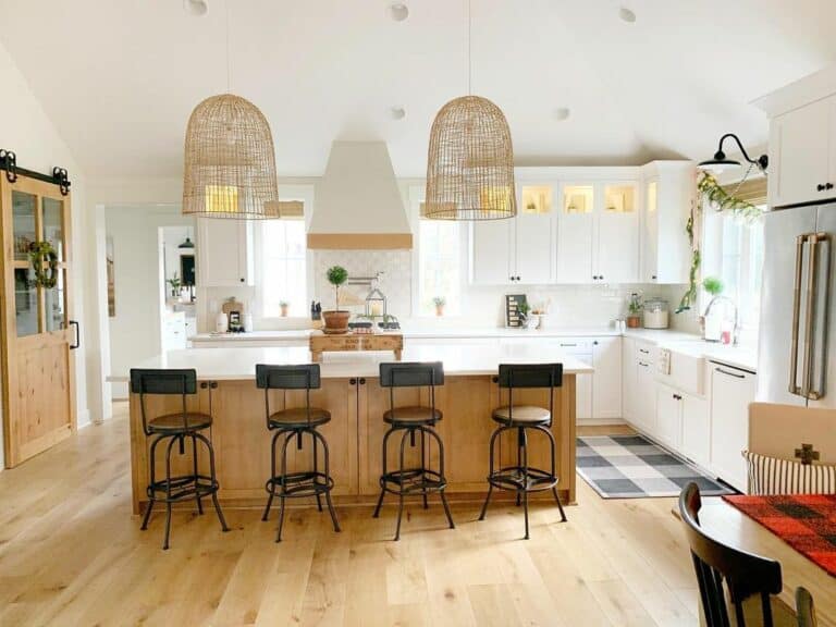 Brown and Black Chairs Under Woven Pendant Lights