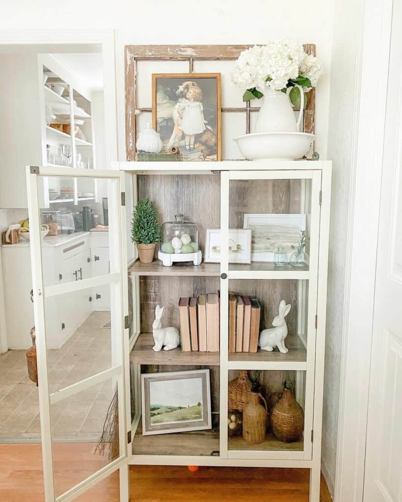 Bunny Décor in White Corner Cabinet