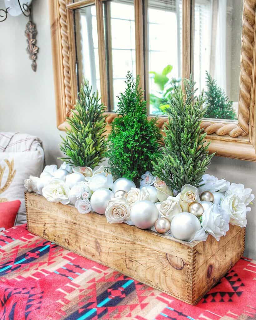 Centerpiece with Silver Ornaments and Pine Trees