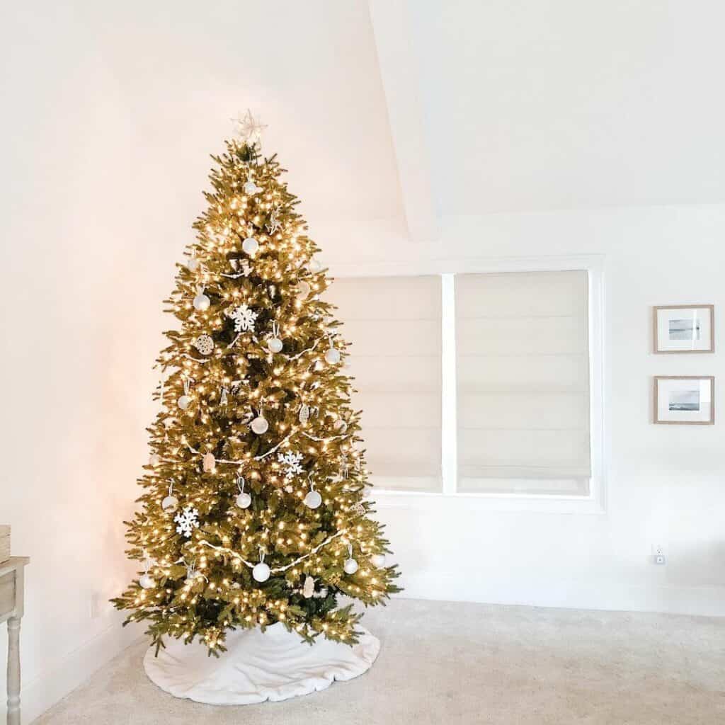 Christmas Tree with White Ornaments and Skirt