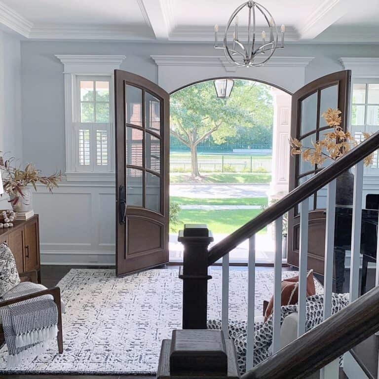 Classic Entryway with Arched Front Doors