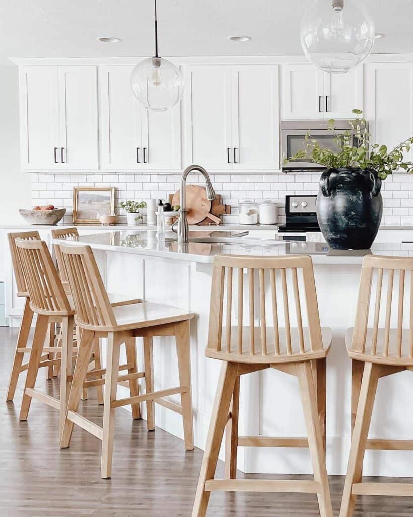 Curved Island Kitchen with Natural Wooden Seating