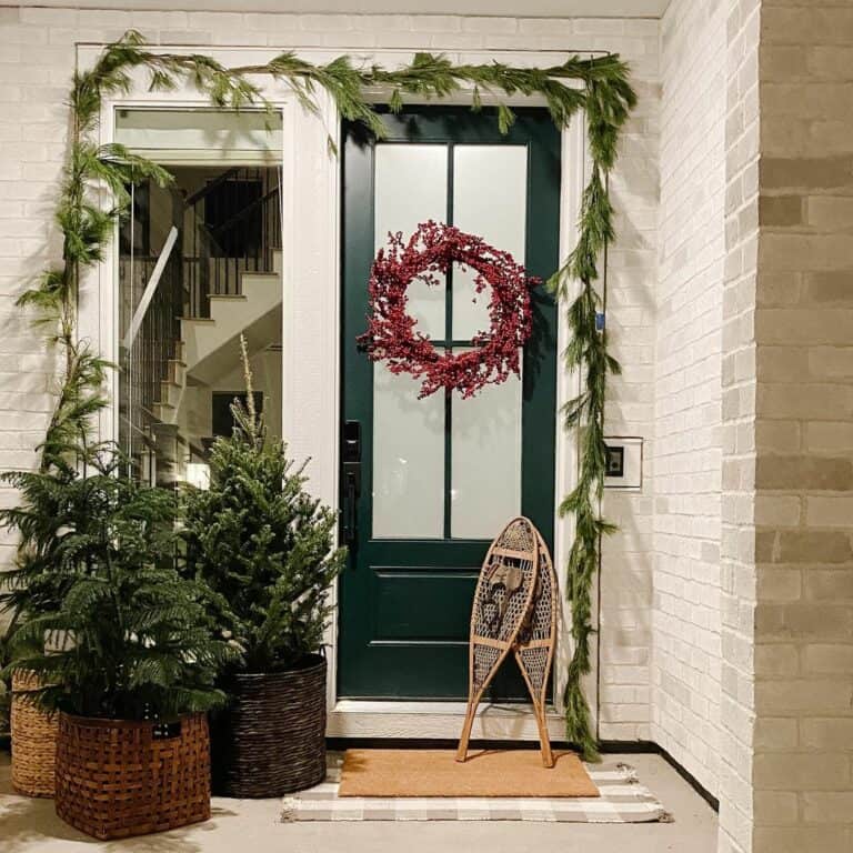 Dark Green Front Porch with Christmas Tree Baskets
