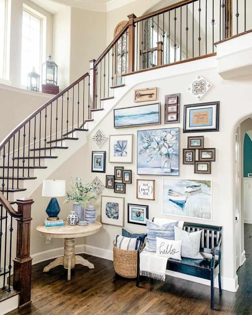 Eclectic Art Wall in Staircase Entryway