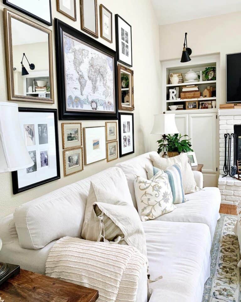 Eclectic Gallery Wall Above White Sofa