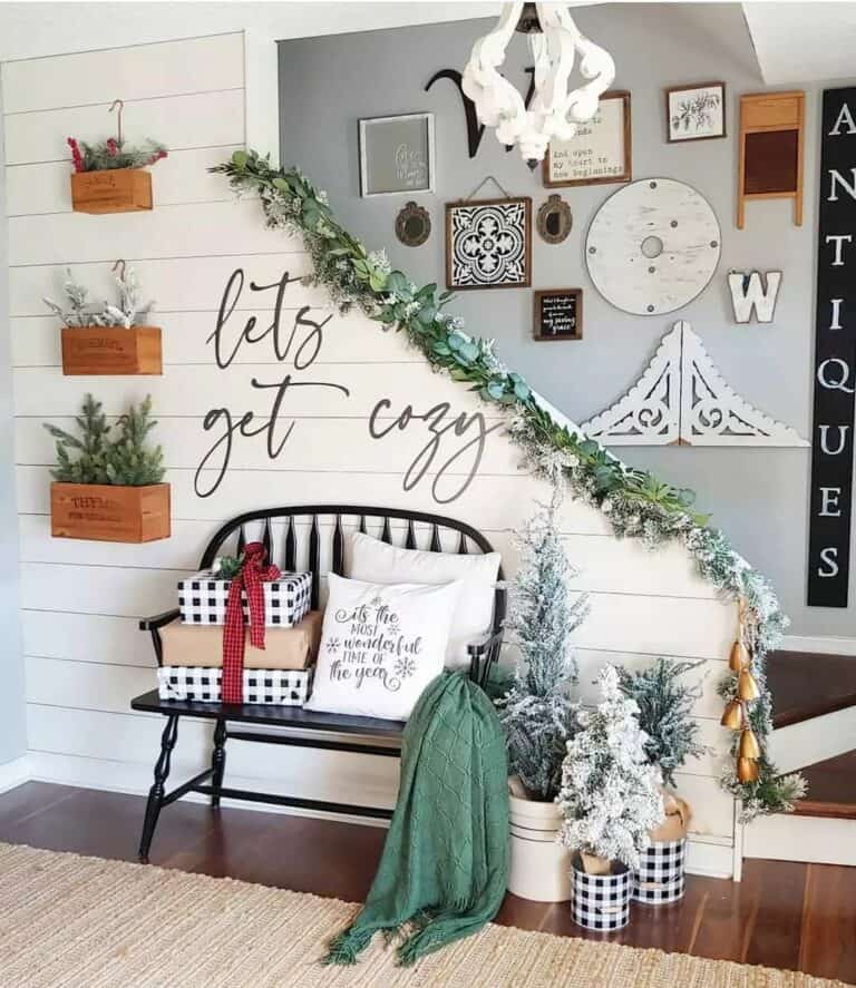 Eclectic Staircase Art Wall in Entryway