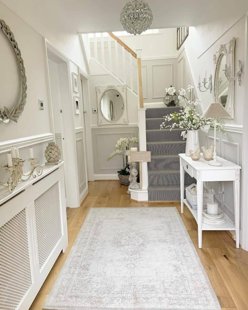 Elegant Entryway with Gray Wainscoting