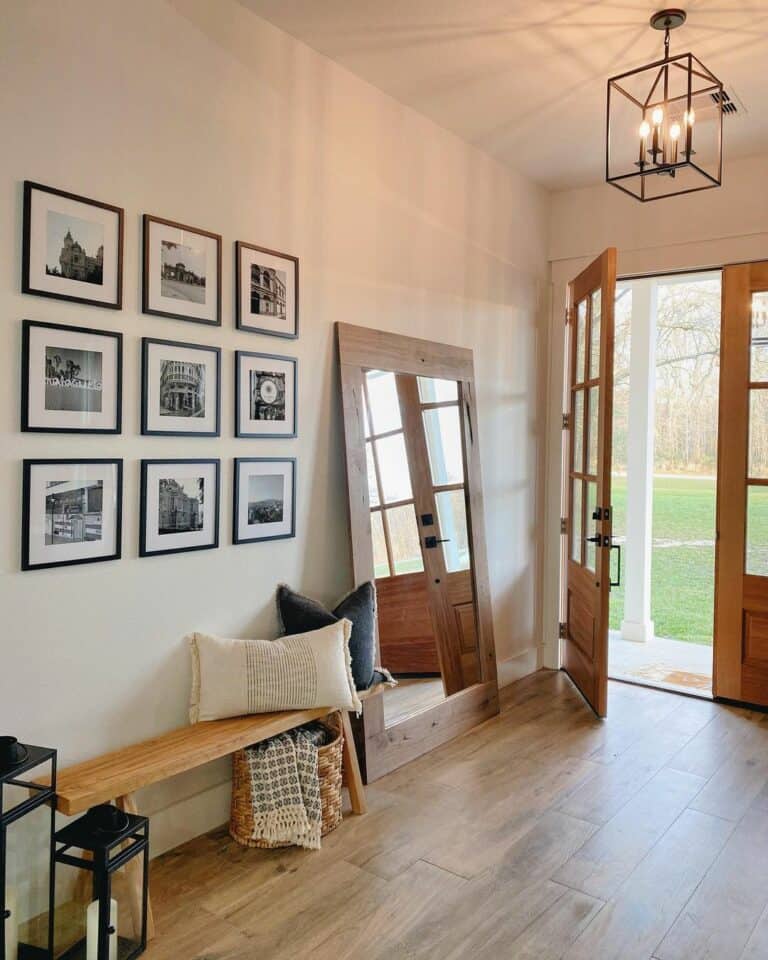 Entryway with Wooden Double French Doors and Gallery Wall