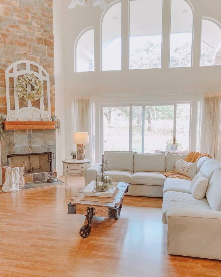 Exposed-Brick Fireplace and Arched Window