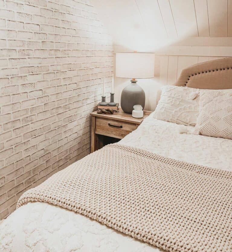 Faux Brick Wall in Slanted Ceiling Bedroom