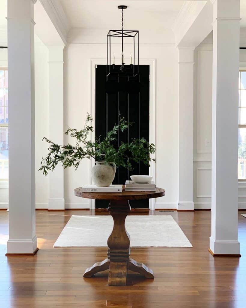 Foyer with Stained Wood Pedestal Entry Table